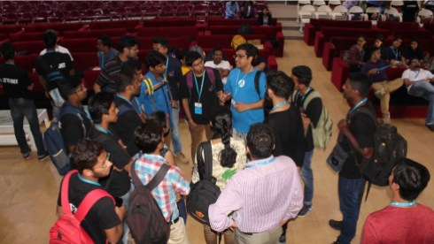 Rahul interacting with attendees